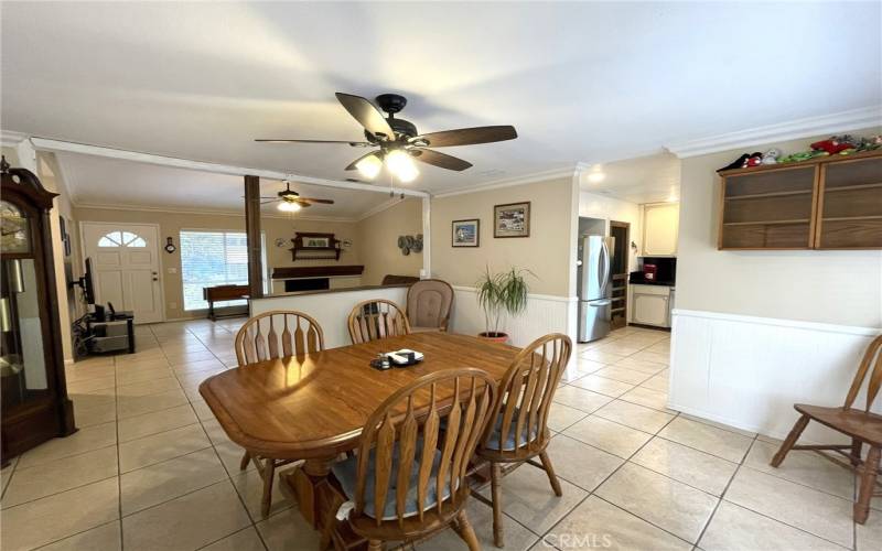 Large Formal Dining Room with Ceiling Fan & Wainscoting Siding