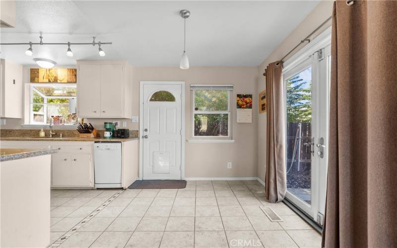 Kitchen-Dining room with door to backyard dog run