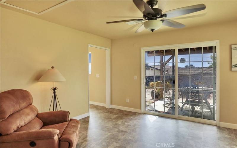 Private side entrance with covered patio