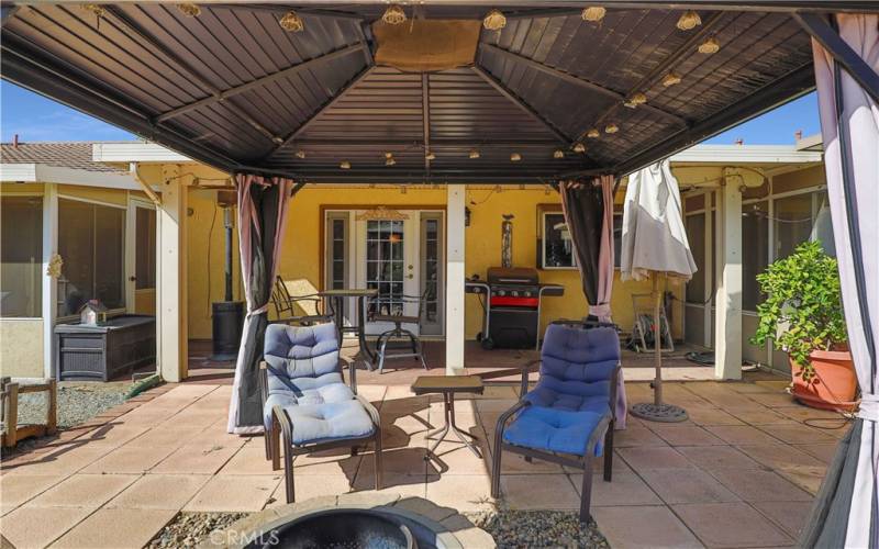 Patio with firepit and covered gazebo