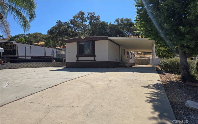 Lots of parking in the driveway and under 2 carports