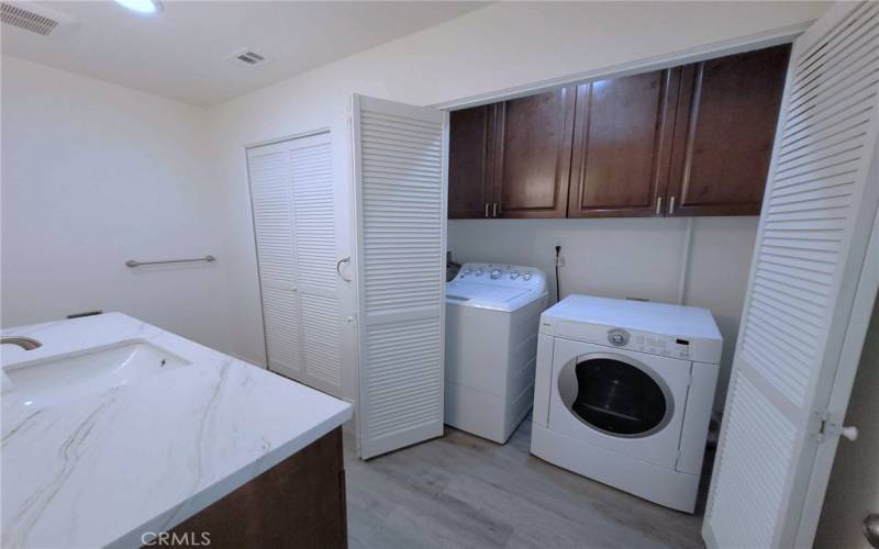 Guest bath laundry closet