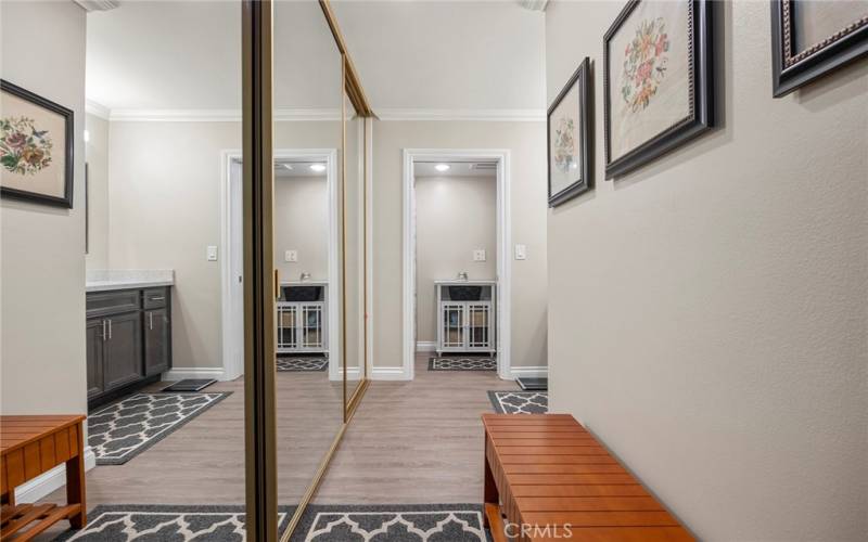 TRIPLE MIRRORED CLOSET DOORS IN PRIMARY SUITE