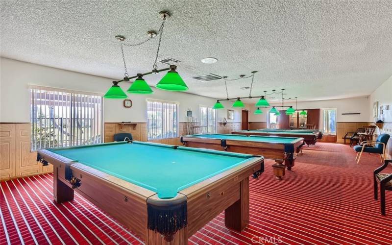 Billiard Parlor with four eight foot tables.