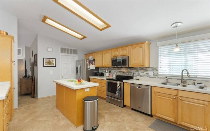 Kitchen looking towards the laundry room.