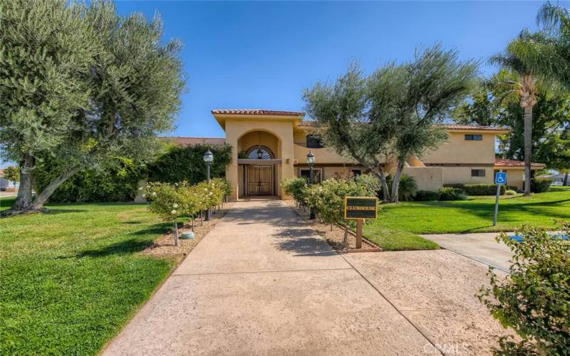 Extraordinary clubhouse featuring a parlor entry with fireplace, auditorium with commercial kitchen, card room and four table billiard parlor.