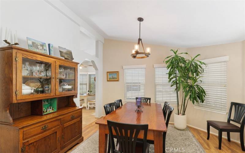 The dining room has wood type floors.