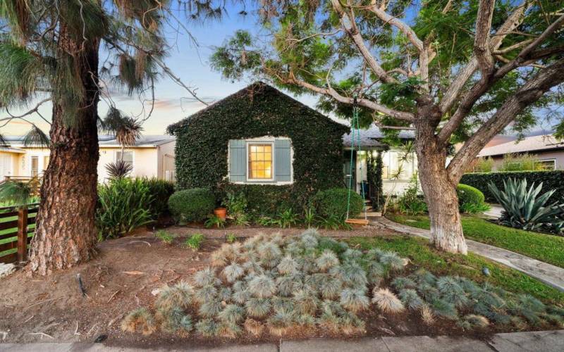 Front & back feature mature landscaping with sprinklers & drip system.