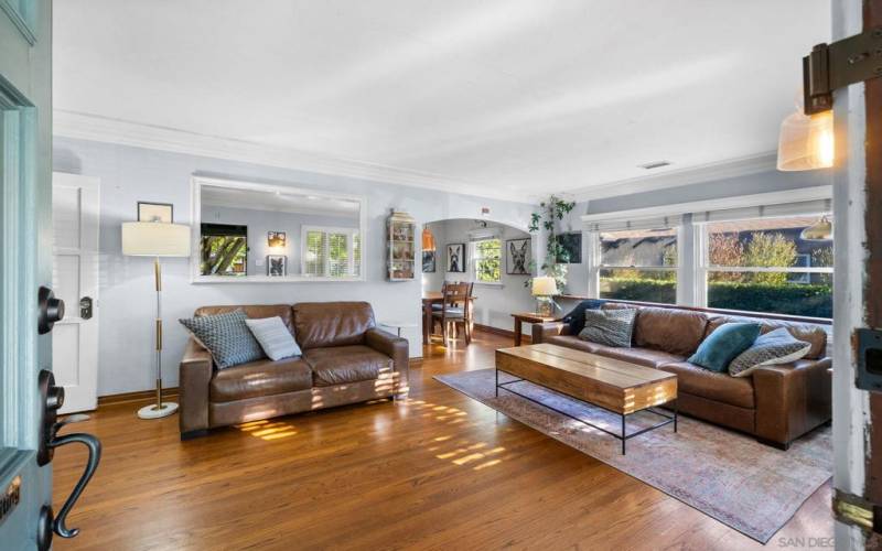 Archways and tray ceilings accent the living and dining area as you enter the home.