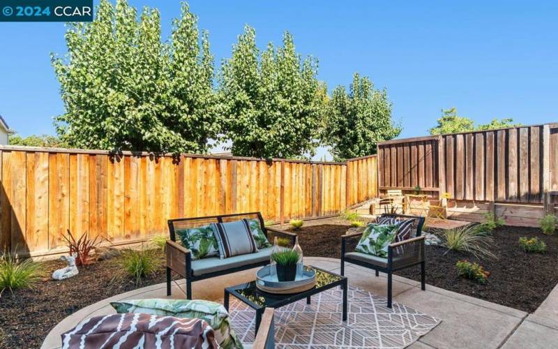 View of backyard landscaping.