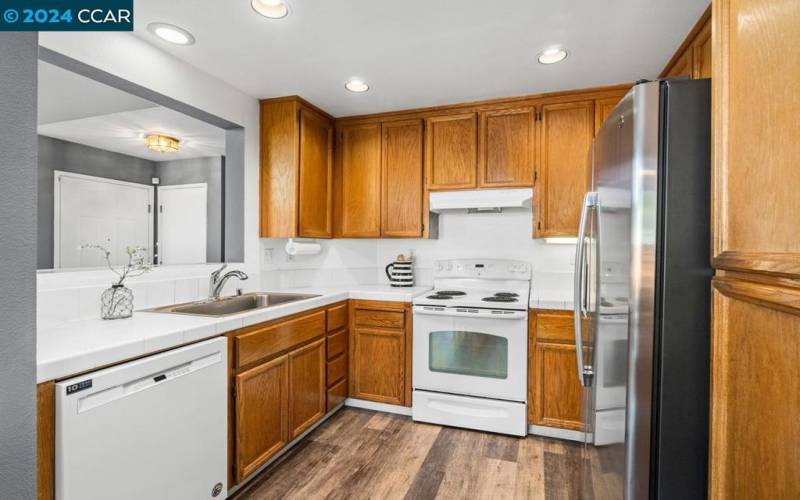 Kitchen with view of entrance.