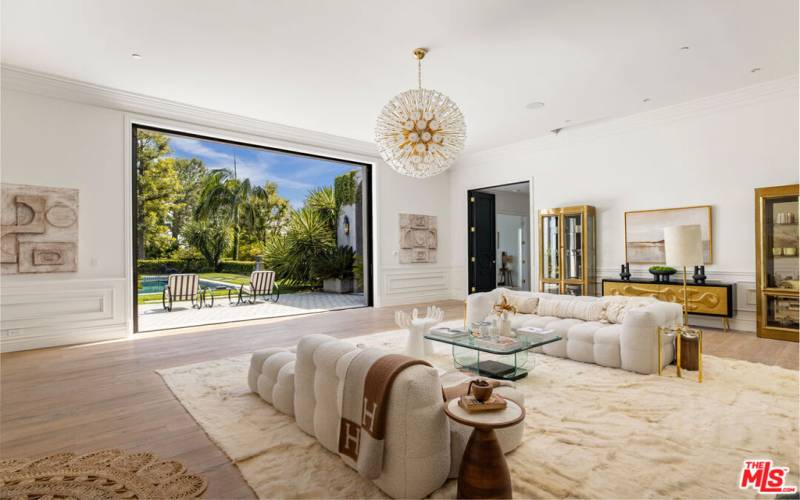 Living room facing South with gorgeous 14ft ceilings open to green yard and complete serenity