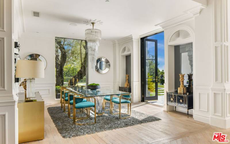 Formal dining room with walk out to yard and views.