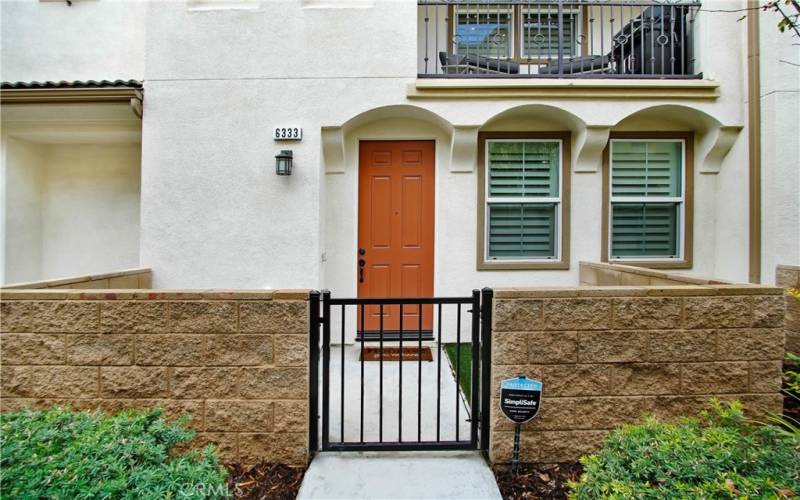 Main entrance at ground level with gated in personal area.