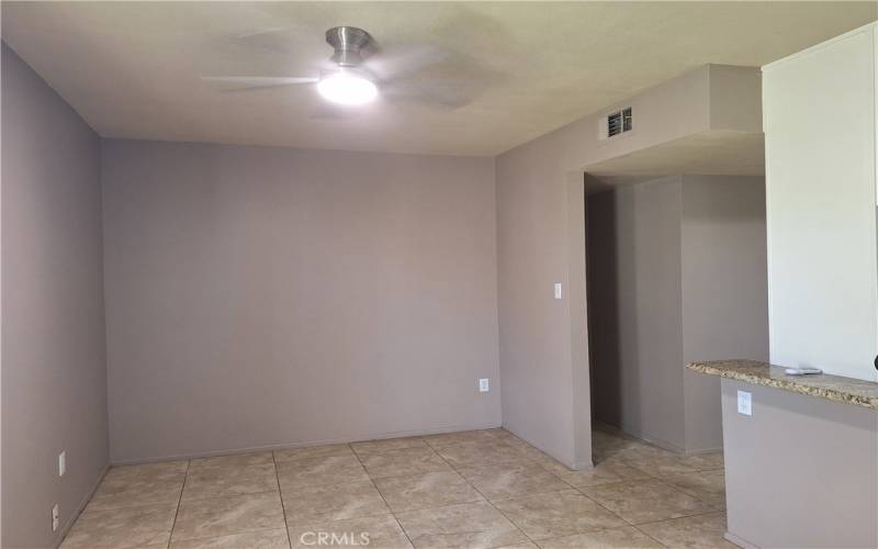 Dining Area or small family room with brand new ceiling fan with lights