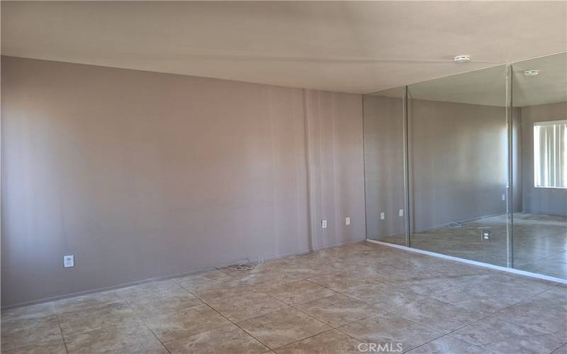 Living room area with mirrored walls