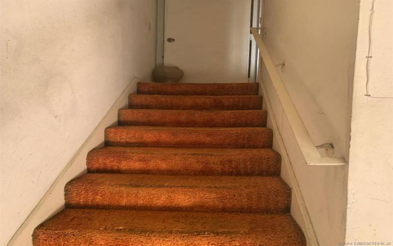 Stairs from garage into Living Room