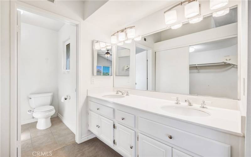 Primary bathroom with double sinks.