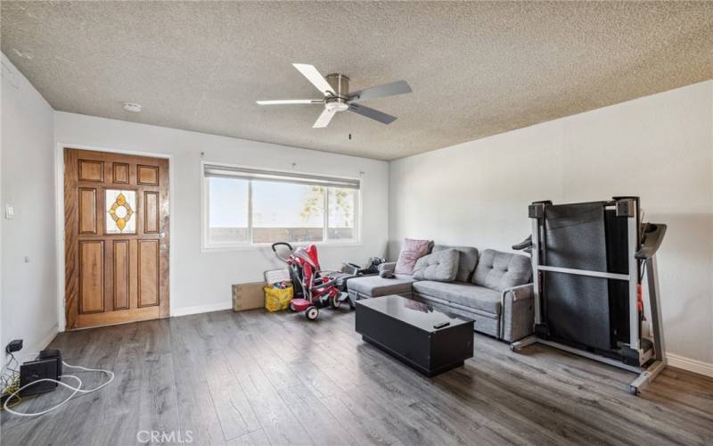 Bottom 1 bedroom unit with newer Vinyl Floors living space.