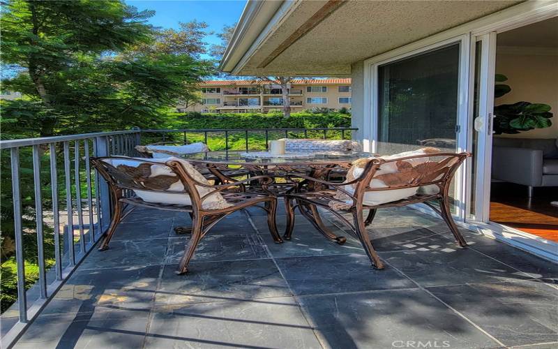 Private patio with a knock-out view of the neighborhood that gets morning sun and afternoon shade.