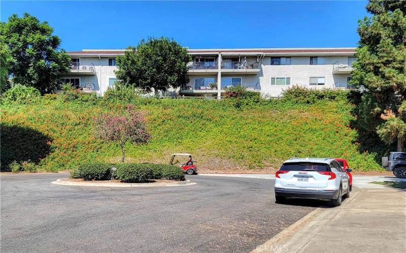 Backside of the building.  This unit is on the top floor, last unit on the left.