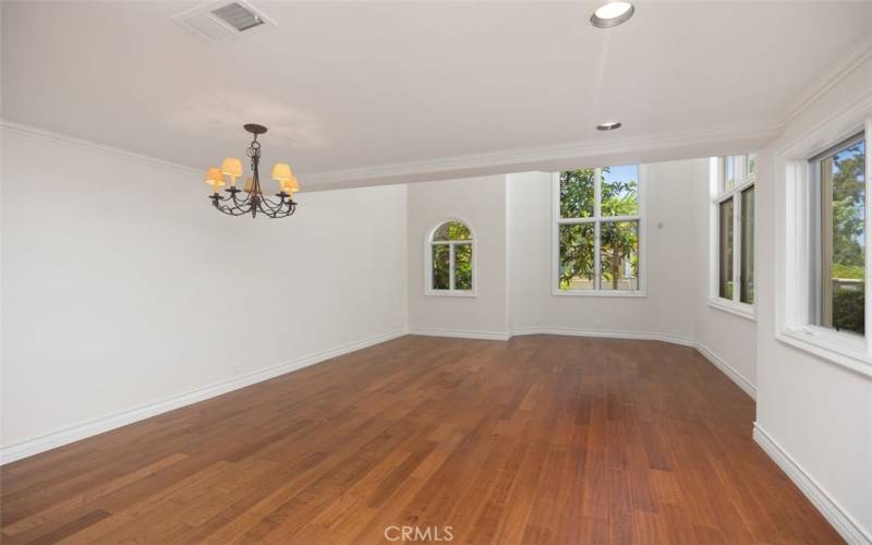 Main floor living room with high ceilings