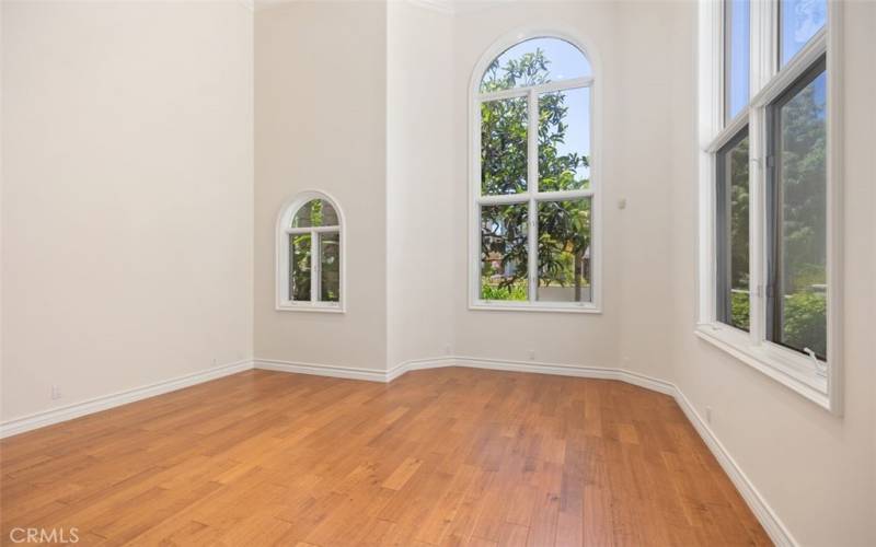 Main floor living room with high ceilings