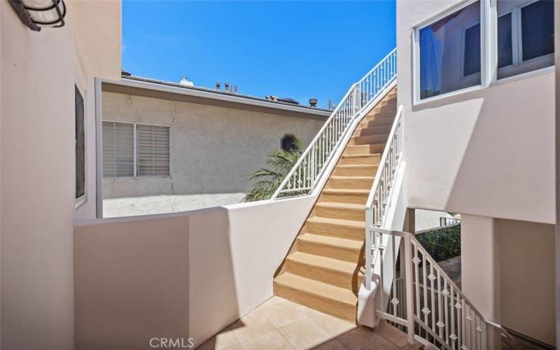 Exterior stairs to roof top deck