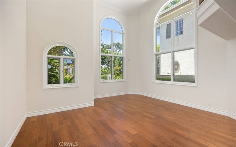 Main floor living room with high ceilings