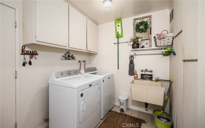 Wonderful laundry room entering from the garage and house.