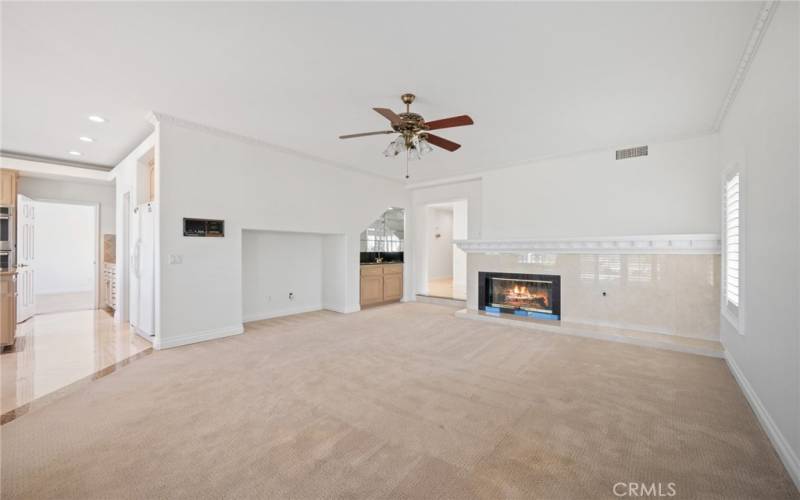 Family Room with fireplace and bar