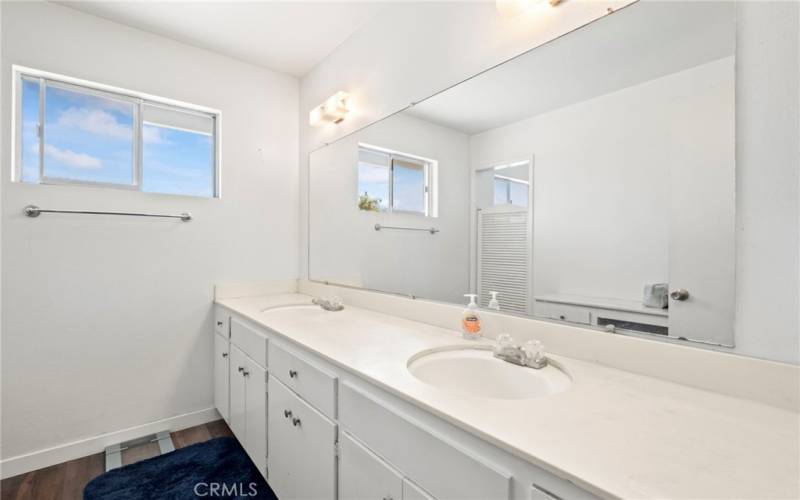 Upstairs bathroom with double sinks