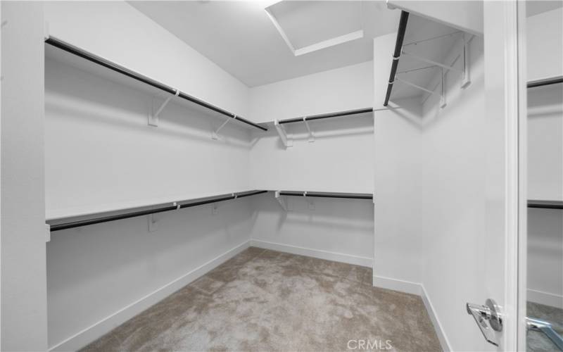 Primary suite walk-in closet.