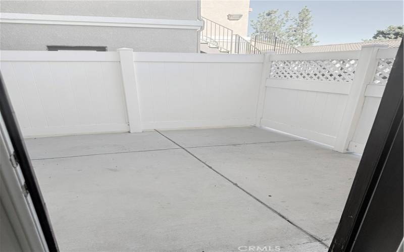 private patio off of the secondary bedroom