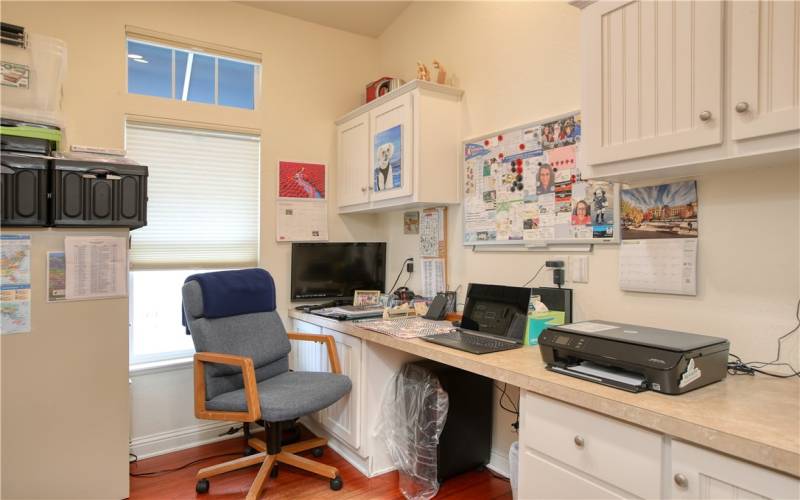 2nd bedroom currently used as office with built-in desk. Closet with shelving.