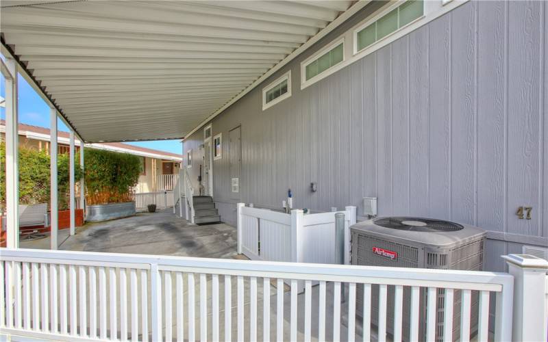 Carport with sliding gate wired for automatic opener.  Central air conditioning too!