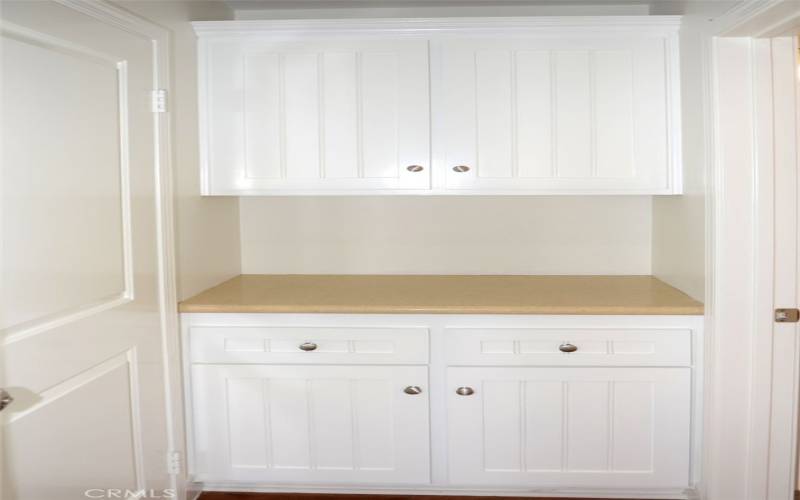 Linen and storage cabinets adjacent to upstairs bedroom.