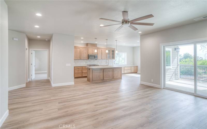 living room area open to the kitchen, master bedroom down the hall