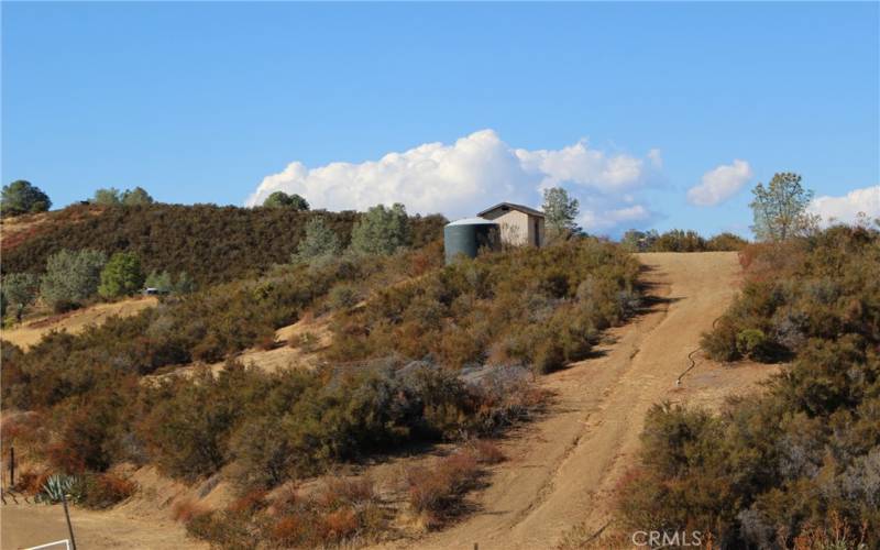 Well house and storage - there is also a shared well with the neighboring property at 19900 Cantwell Ranch Rd, plenty of water here for all your household and gardening needs.