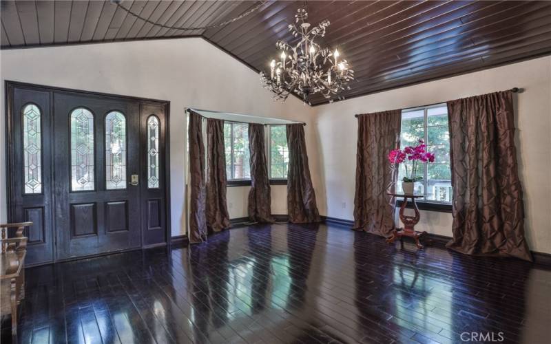 Living room with front door view