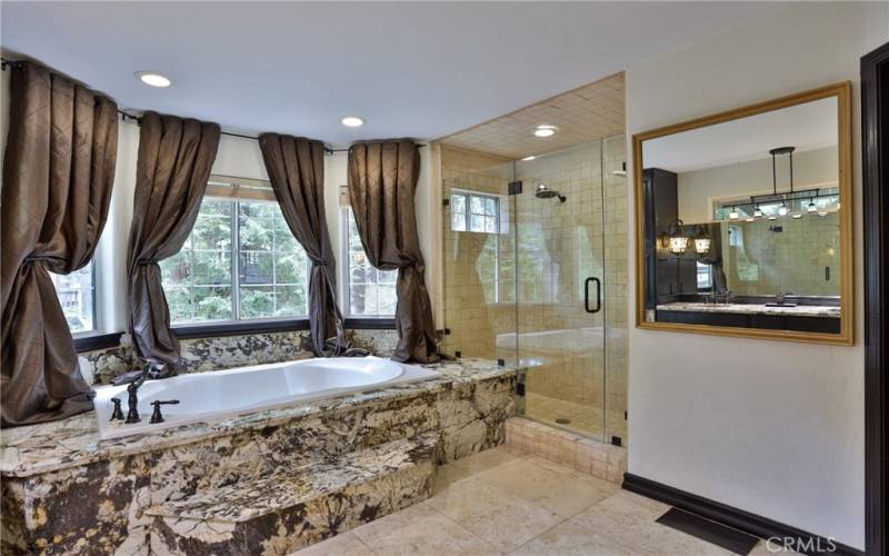 Primary bathroom with jetted tub and walk in shower