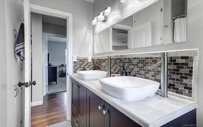 BEAUTIFULLY PRESENTED BATHROOM WITH DUAL SINKS