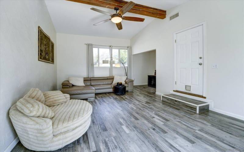 LOVE THIS VAULTED CEILING-EXPOSED BEAM-LUXURY VINYL FLOORING-JUST ALL AROUND A GREAT ROOM TO SPEND TIME WITH FAMILY,FRIENDS OR MAKE AN HOME OFFICE!