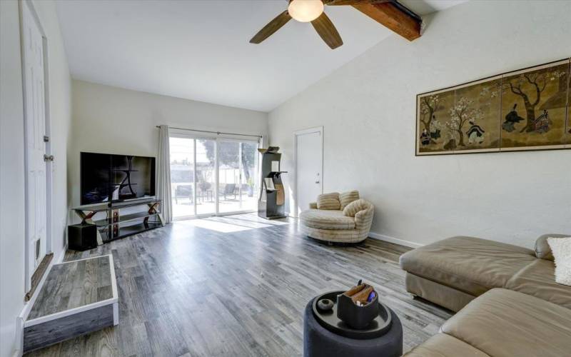 LOVE THIS VAULTED CEILING-EXPOSED BEAM-LUXURY    VINYL FLOORING-JUST ALL AROUND A GREAT ROOM TO SPEND TIME WITH FAMILY,FRIENDS OR MAKE AN HOME OFFICE!