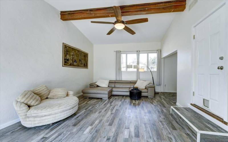 LOVE THIS VAULTED CEILING-EXPOSED BEAM-FLOORING-JUST ALL AROUND A GREAT ROOM TO SPEND TIME WITH FAMILY,FRIENDS OR MAKE AN HOME OFFICE!