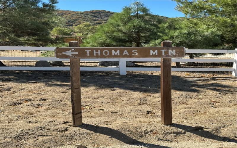 Entrance to Thomas Mountain and National Forest located just down the street from the lot.