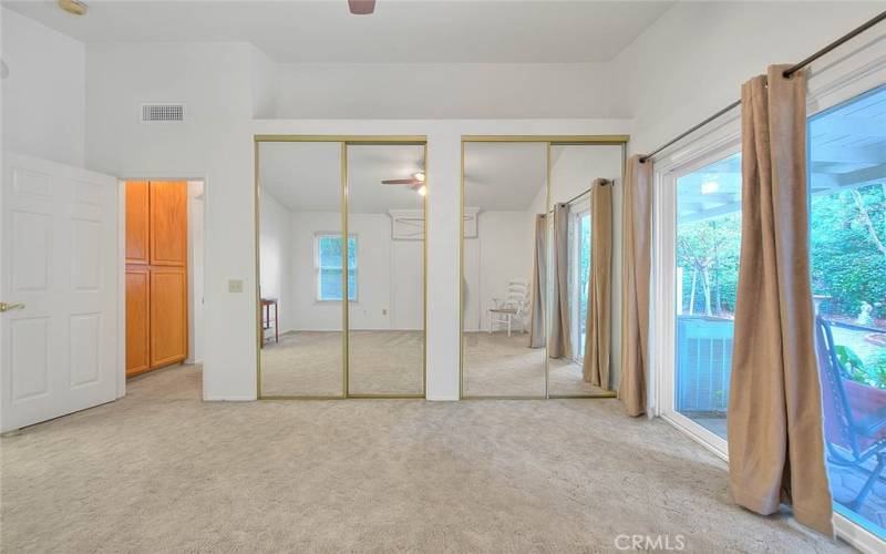 Primary bedroom, vaulted ceilings, double closets