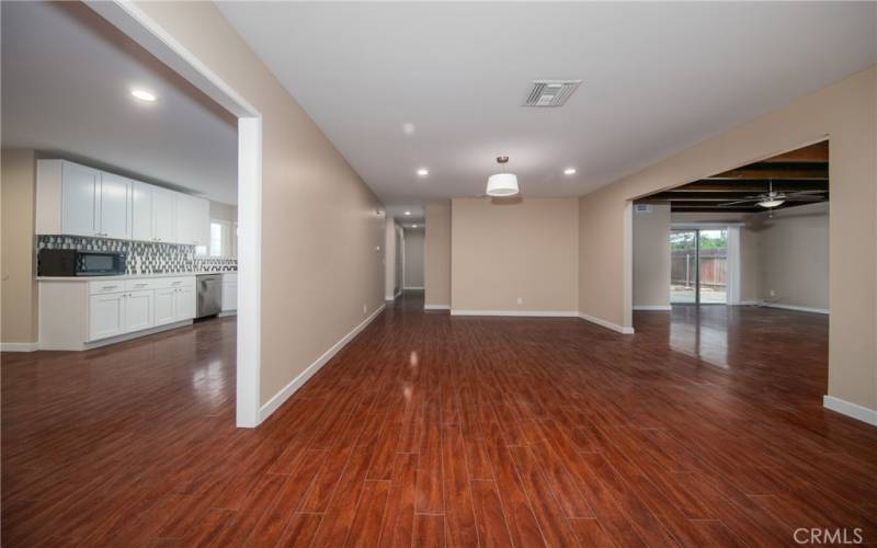 Living room and partial kitchen view