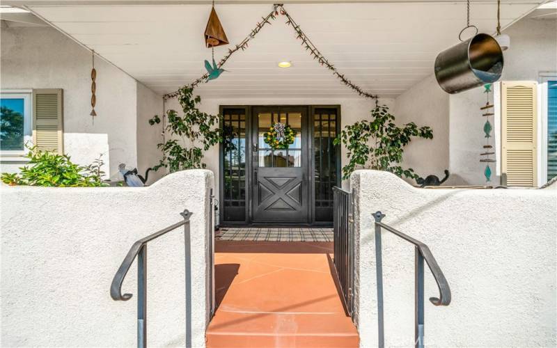 Classic front porch with beautiful vintage door