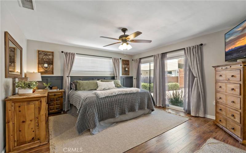 Primary bedroom with backyard access